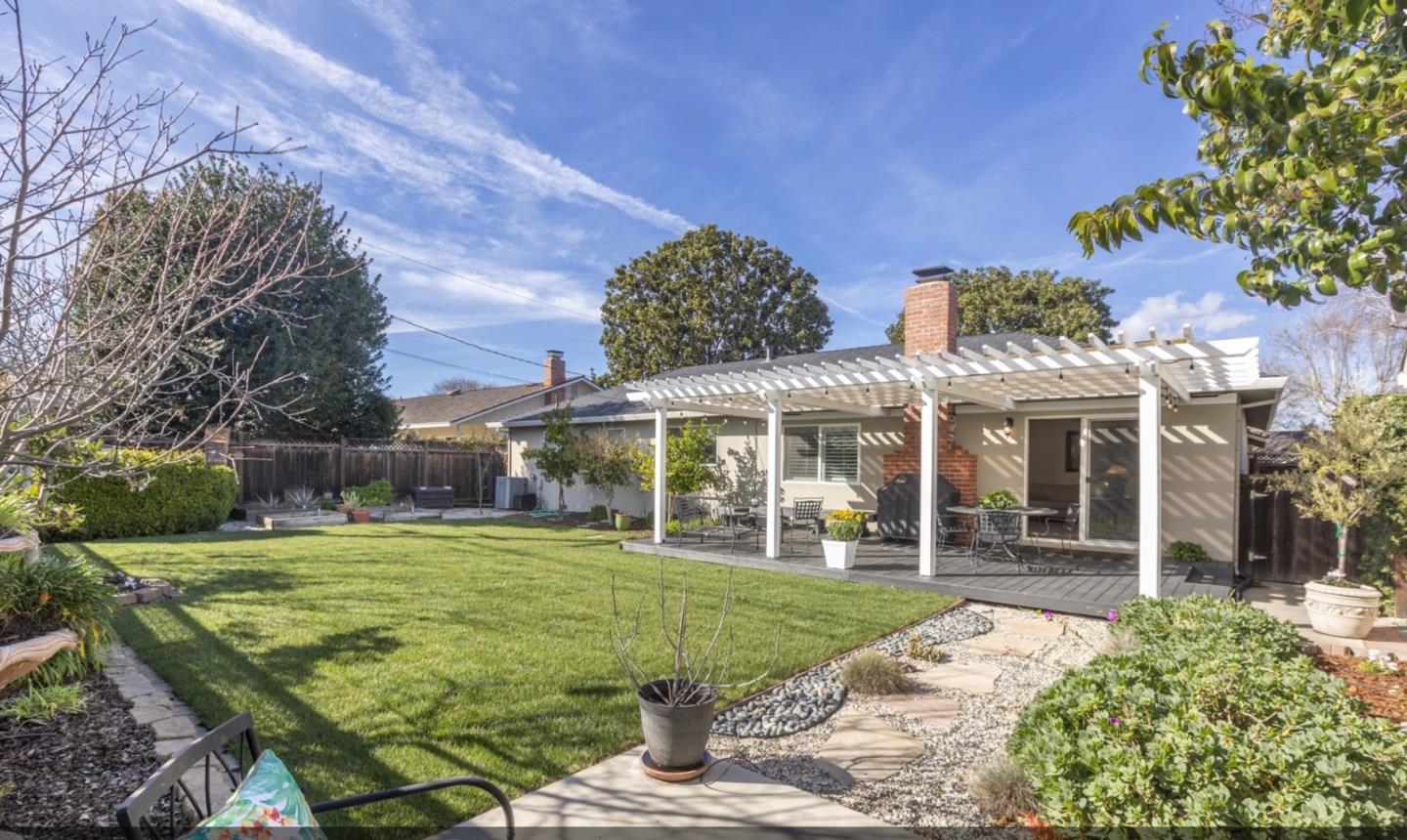 1470 Ridgeley Drive Campbell, CA 95008 - Photo 10 of 12 a view of a building with a yard