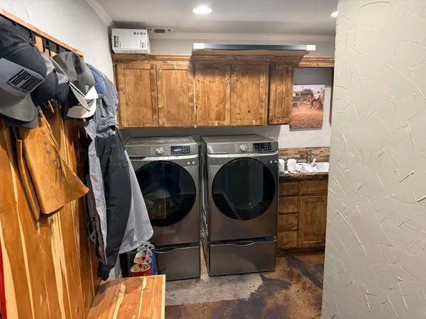 a bathroom with a toilet a sink and bathtub