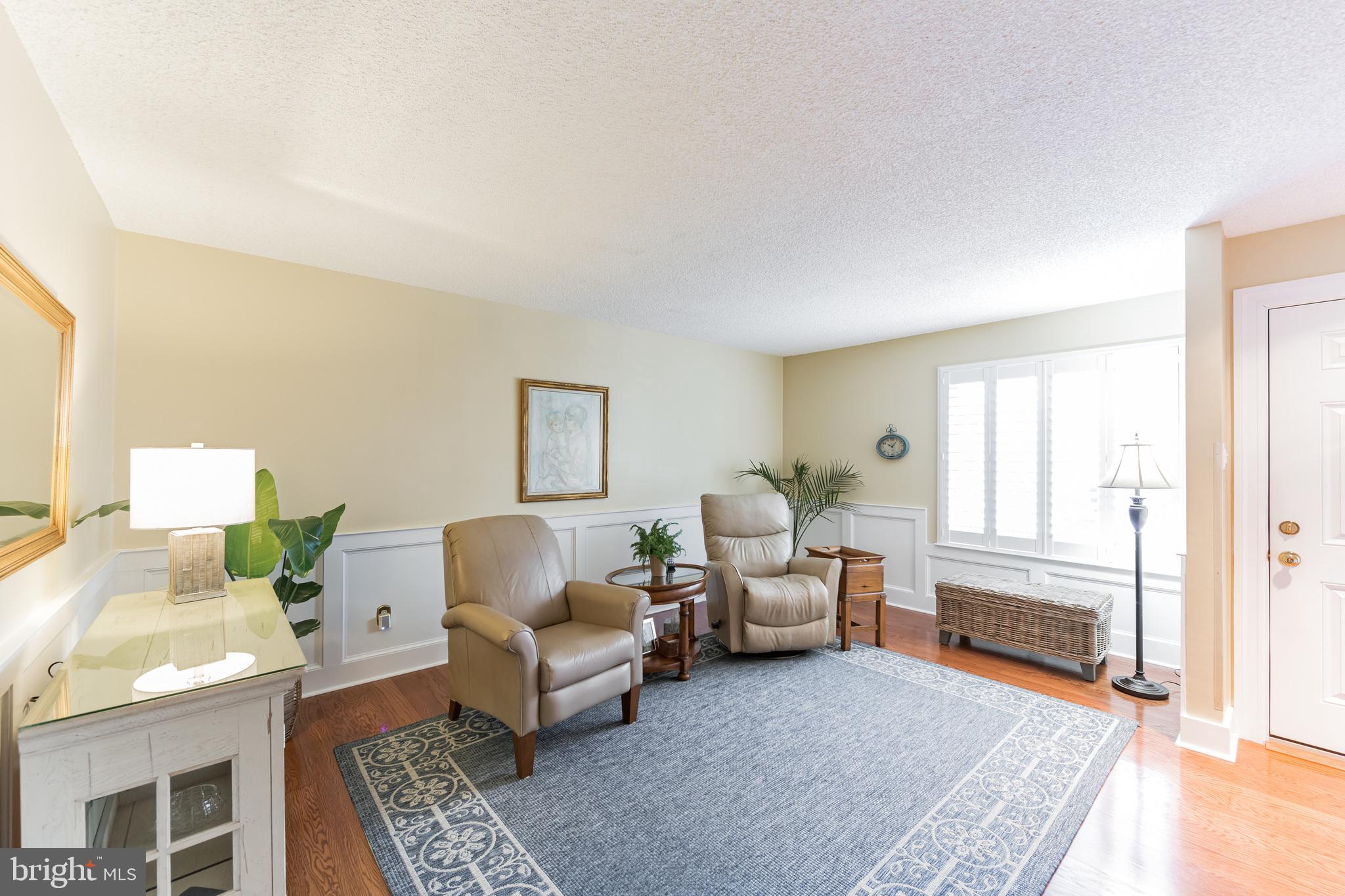 40 Constitution Court Chesterbrook, PA 19087 - Photo 3 of 32 Bright Living room has custom plantation shutters