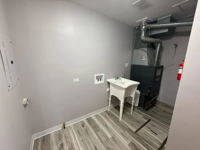 a view of a room with racks on the wall