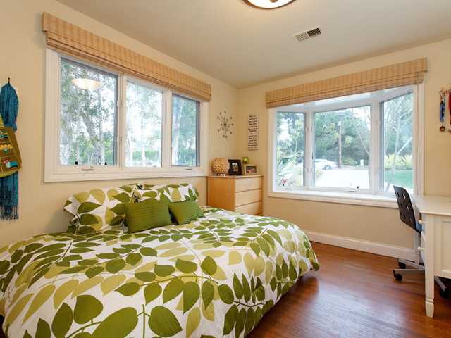 1316 Crest Road Del Mar, CA 92014 - Photo 13 of 25 Warm and cozy second bedrooms afford plenty of room for kids or as a guest room or office too