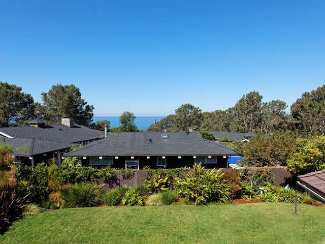 1316 Crest Road Del Mar, CA 92014 - Photo 20 of 25 This property sits on a large 9,900 square foot lot! Here is the front yard as seen from the drive. Oh...and you have so much parking available to you...which is worth its weight in gold in Del Mar! Let's go to the beach!