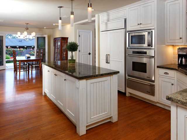 1316 Crest Road Del Mar, CA 92014 - Photo 6 of 25 Glorious kitchen with adjoining formal dining area creates a perfect gathering area for family, friends and fun.