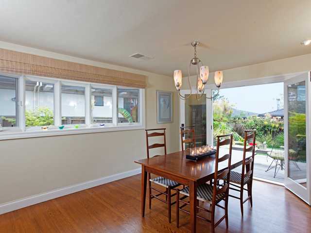 1316 Crest Road Del Mar, CA 92014 - Photo 9 of 25 Very large dining room has direct access out to wonderful teak decking and the spacious, west-facing back yard