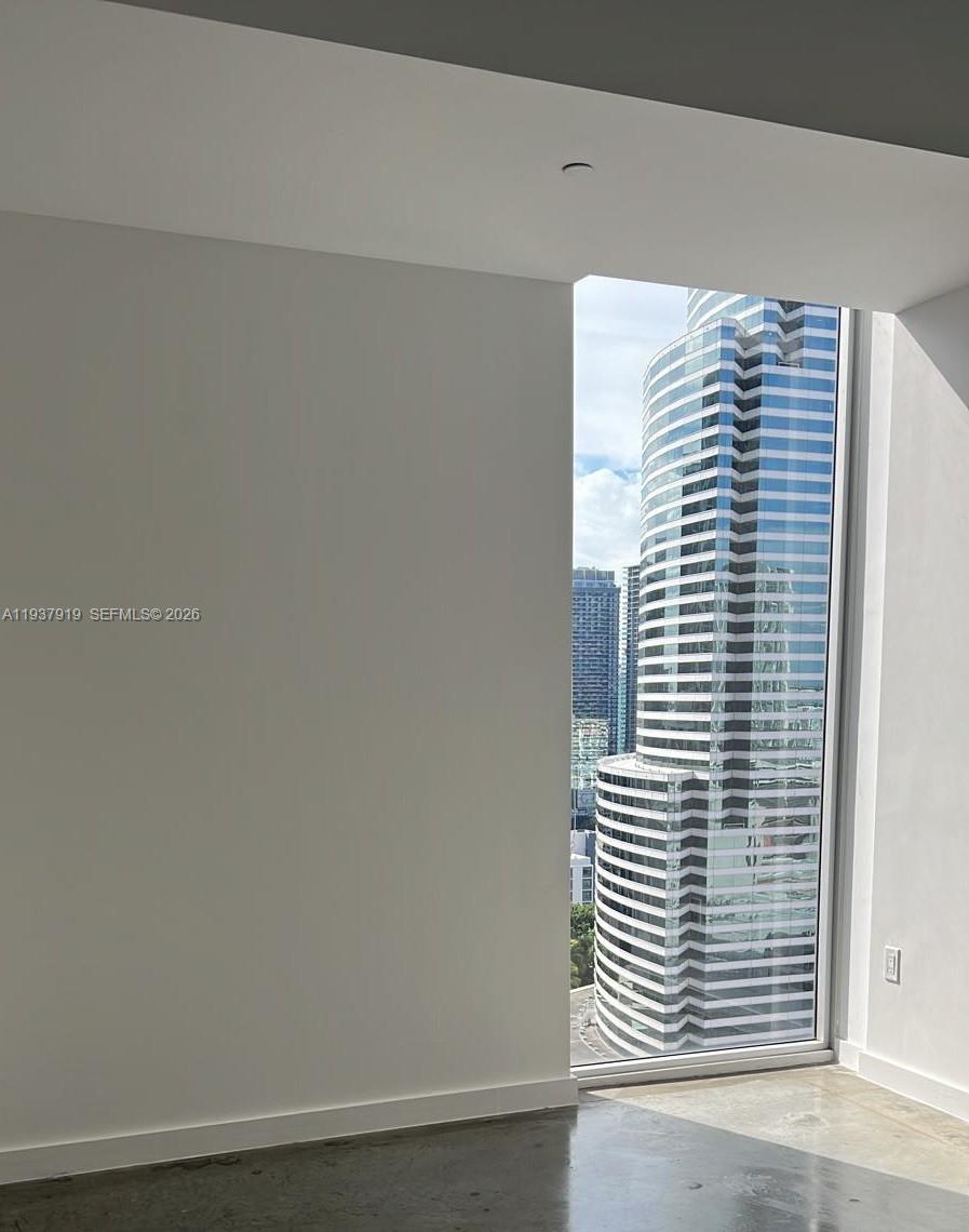 151 Southeast 1st Street, Unit 2507 Miami, FL 33131 - Photo 7 of 34 a view of a wooden floor