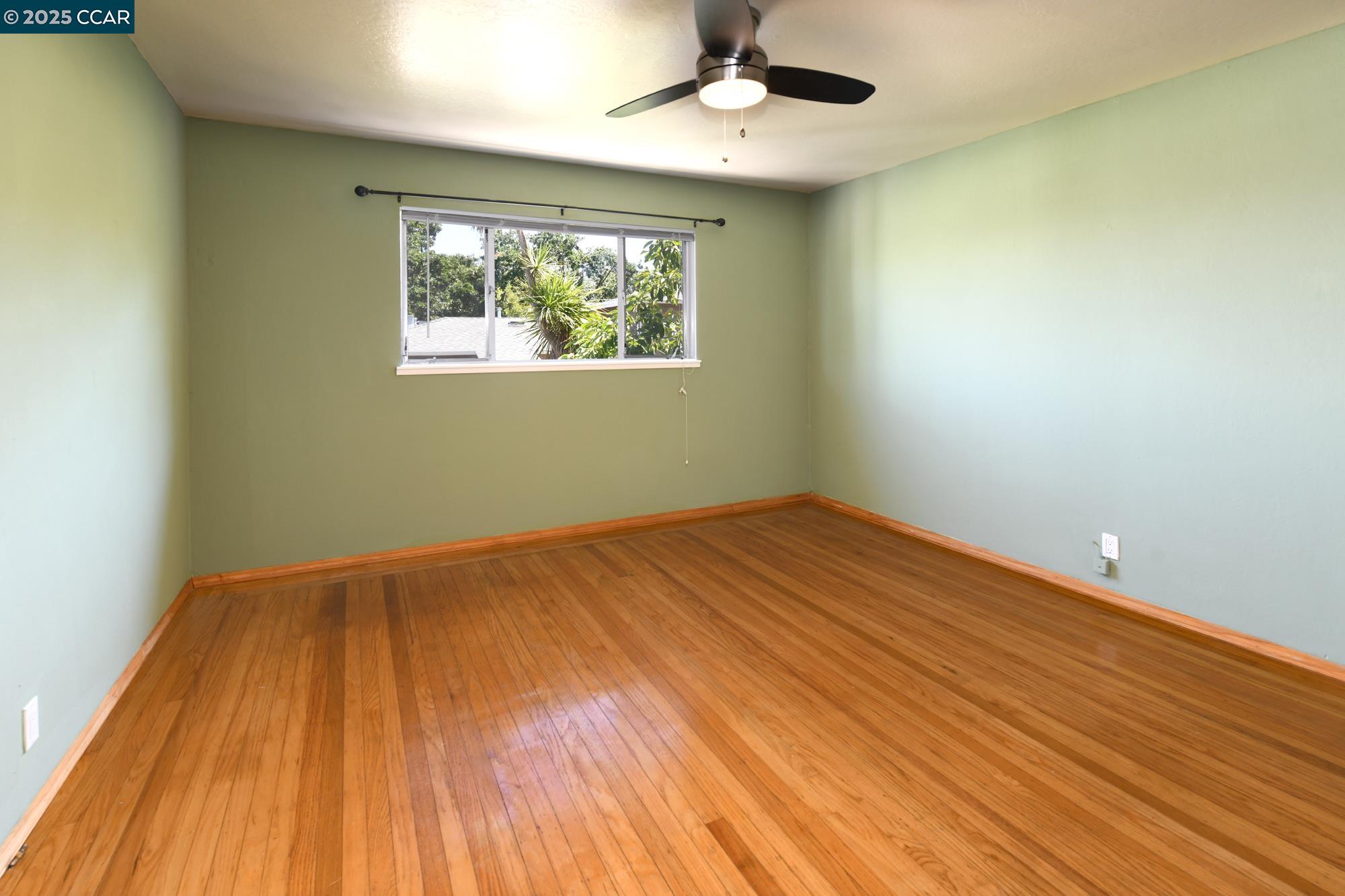 1672 Terrace Road Walnut Creek, CA 94597 - Photo 11 of 38 a view of empty room with wooden floor