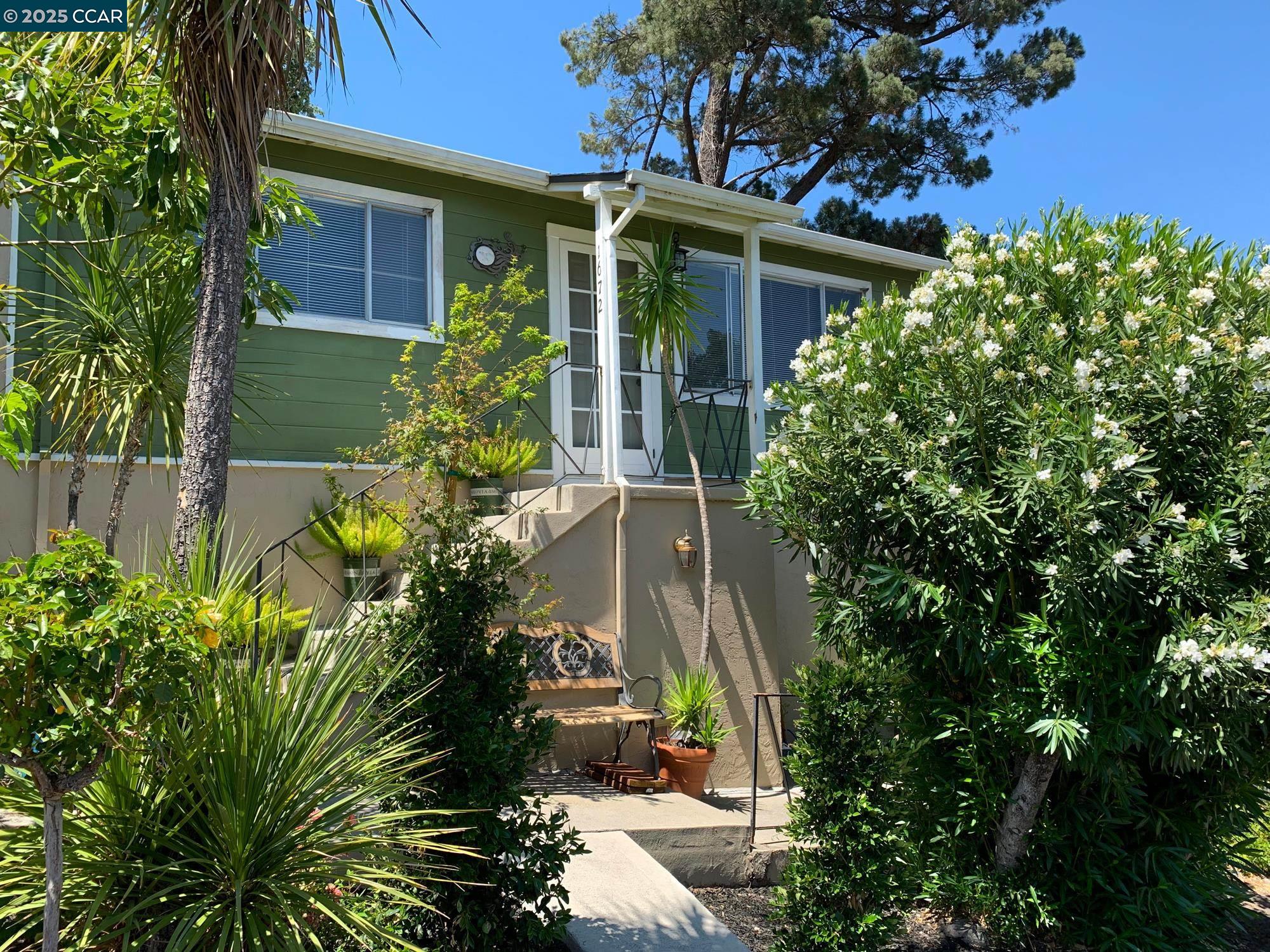 1672 Terrace Road Walnut Creek, CA 94597 - Photo 24 of 38 a front view of a house with a yard