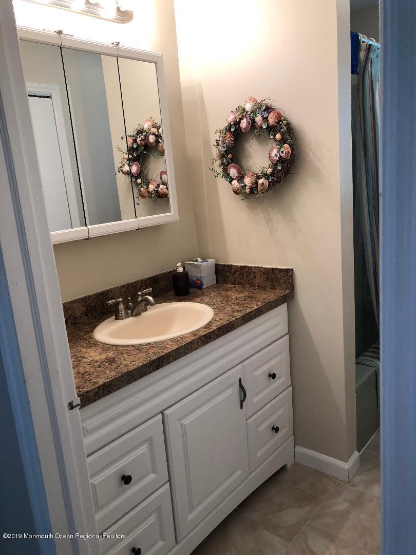 99 A Evesham Road, Unit A Freehold, NJ 07728 - Photo 17 of 34 main bath 1