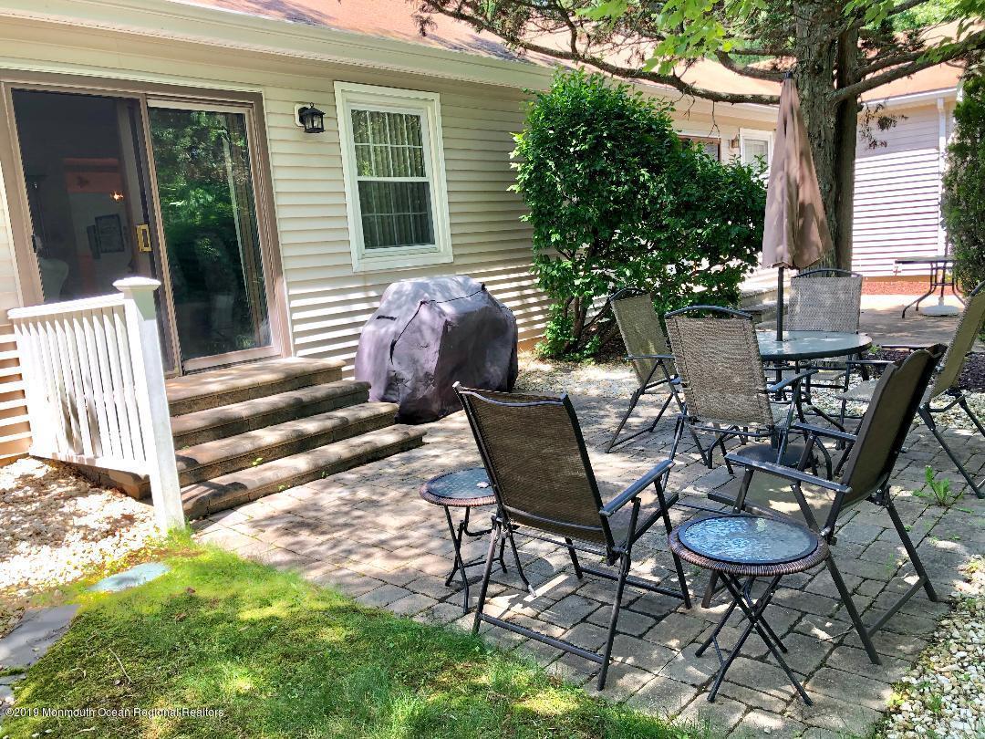 99 A Evesham Road, Unit A Freehold, NJ 07728 - Photo 28 of 34 patio 1