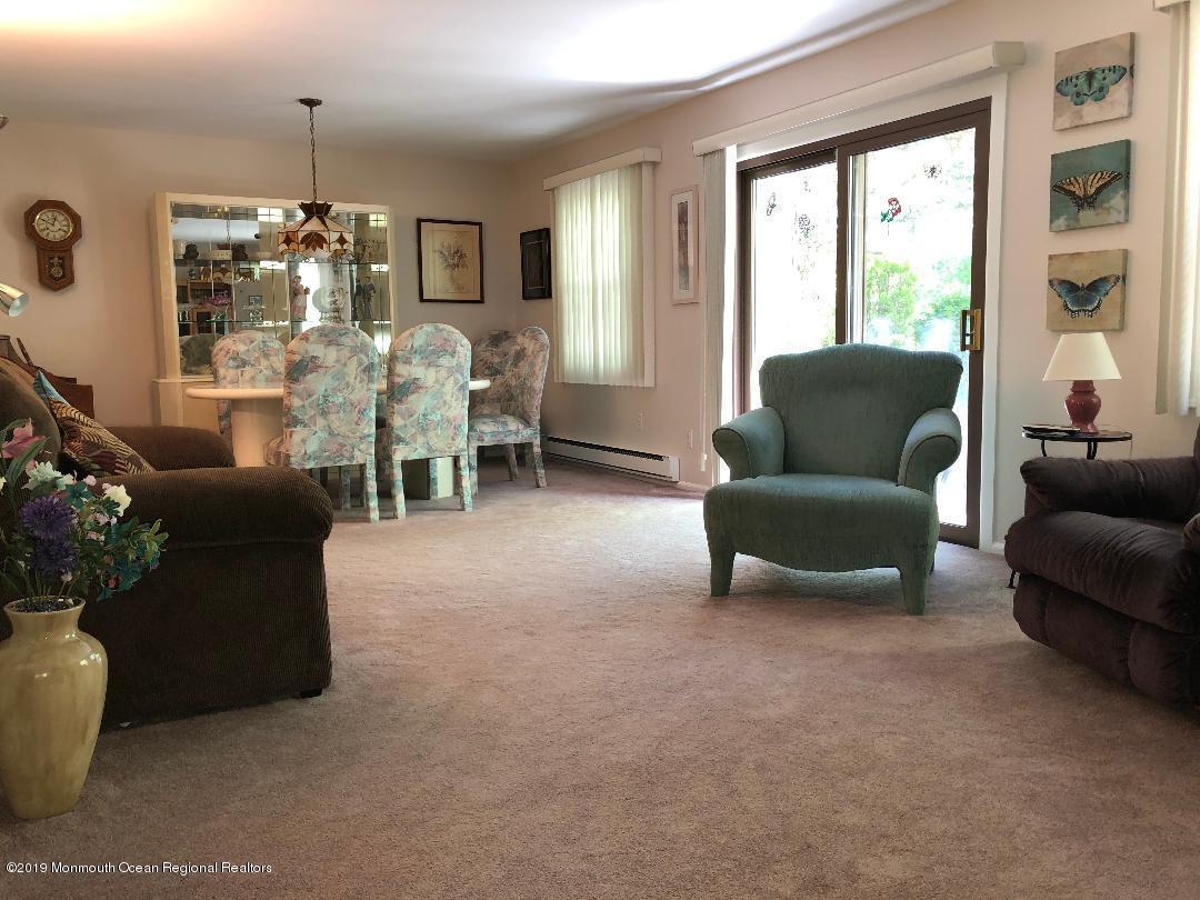 99 A Evesham Road, Unit A Freehold, NJ 07728 - Photo 5 of 34 living/dining room