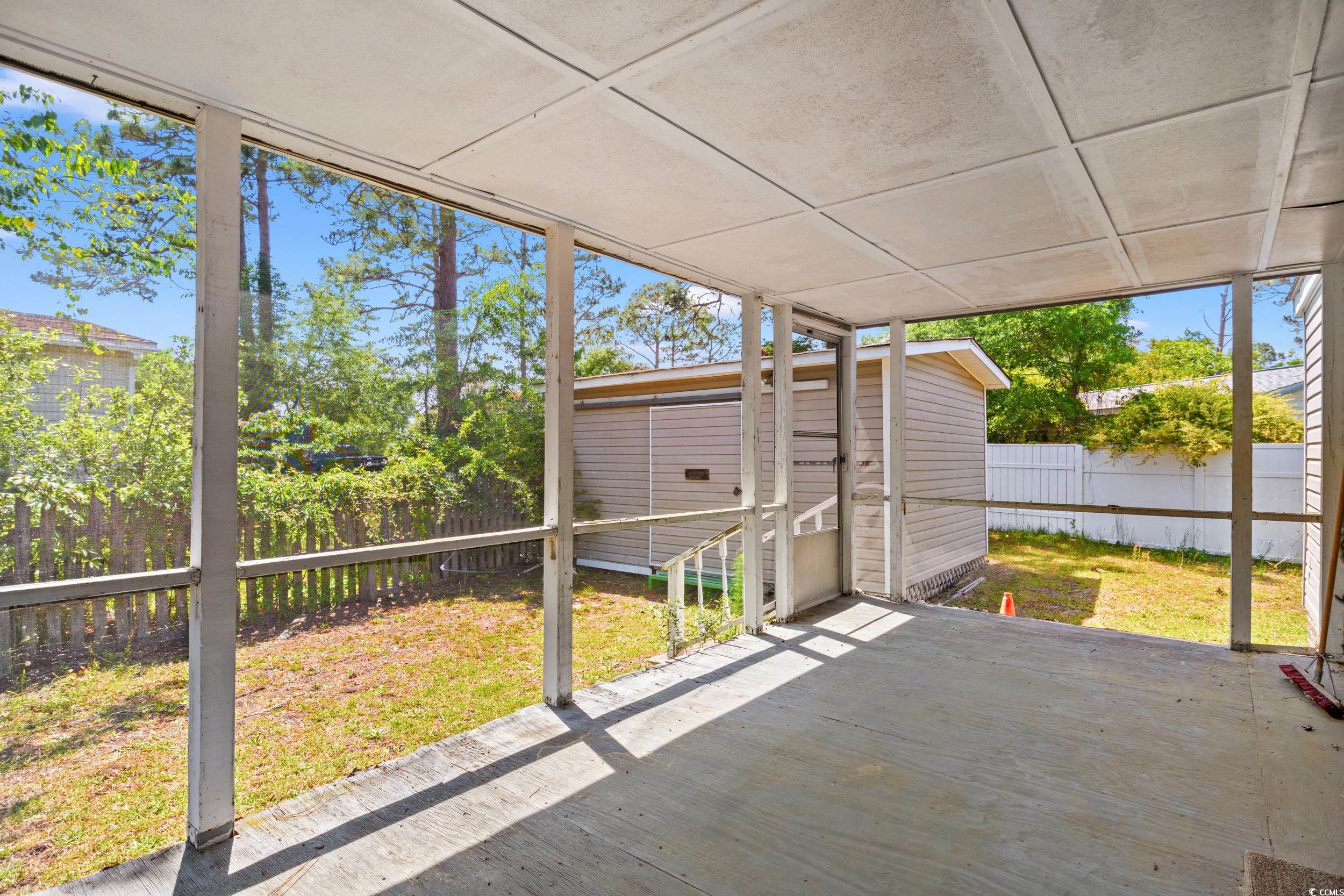 563 Plum Court Myrtle Beach, SC 29579 - Photo 27 of 34 Unfurnished sunroom with plenty of natural light