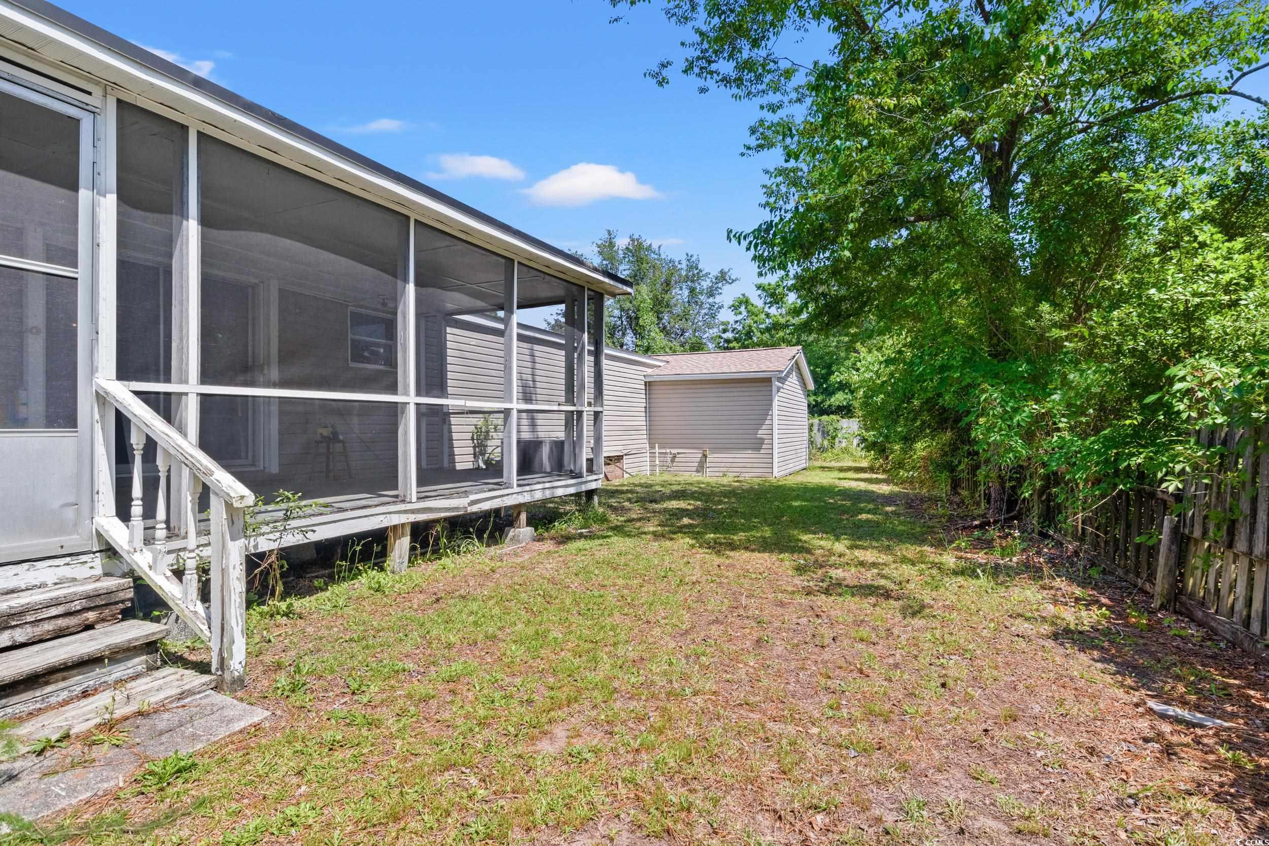 563 Plum Court Myrtle Beach, SC 29579 - Photo 29 of 34 View of yard featuring a sunroom