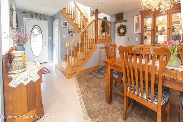 a view of balcony with wooden floor and fence