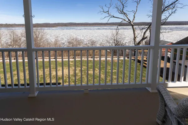 a bedroom with bed and a window