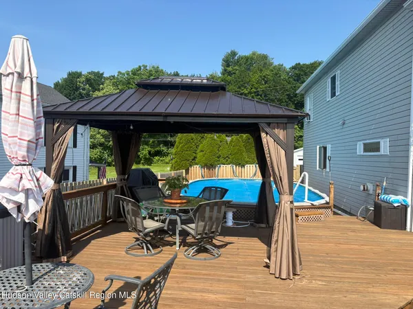 a view of a patio on the deck