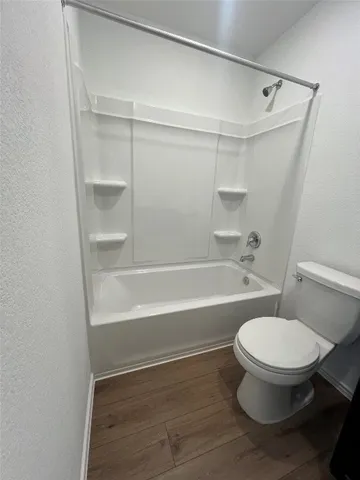 a view of kitchen center microwave and cabinets