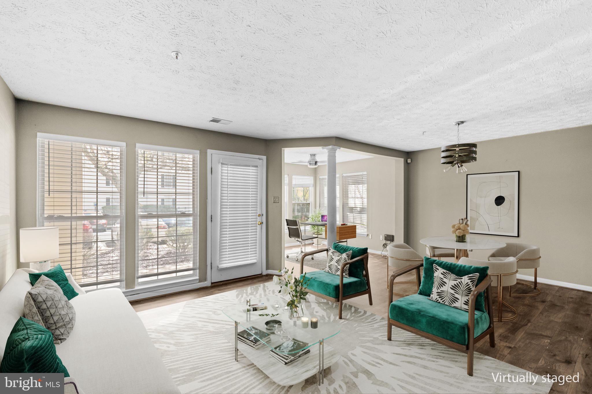 4840 Shellbark Road, Unit 4840 Owings Mills, MD 21117 - Photo 6 of 47 a living room with furniture and a large window