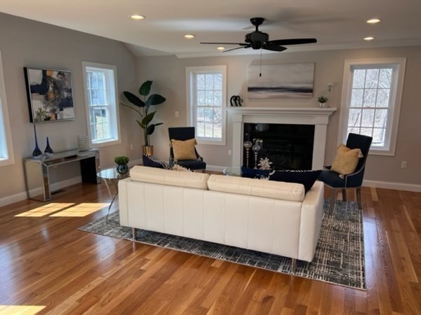 2 Pelissier Circle Randolph, MA 02368 - Photo 14 of 29 a living room with furniture and a fireplace