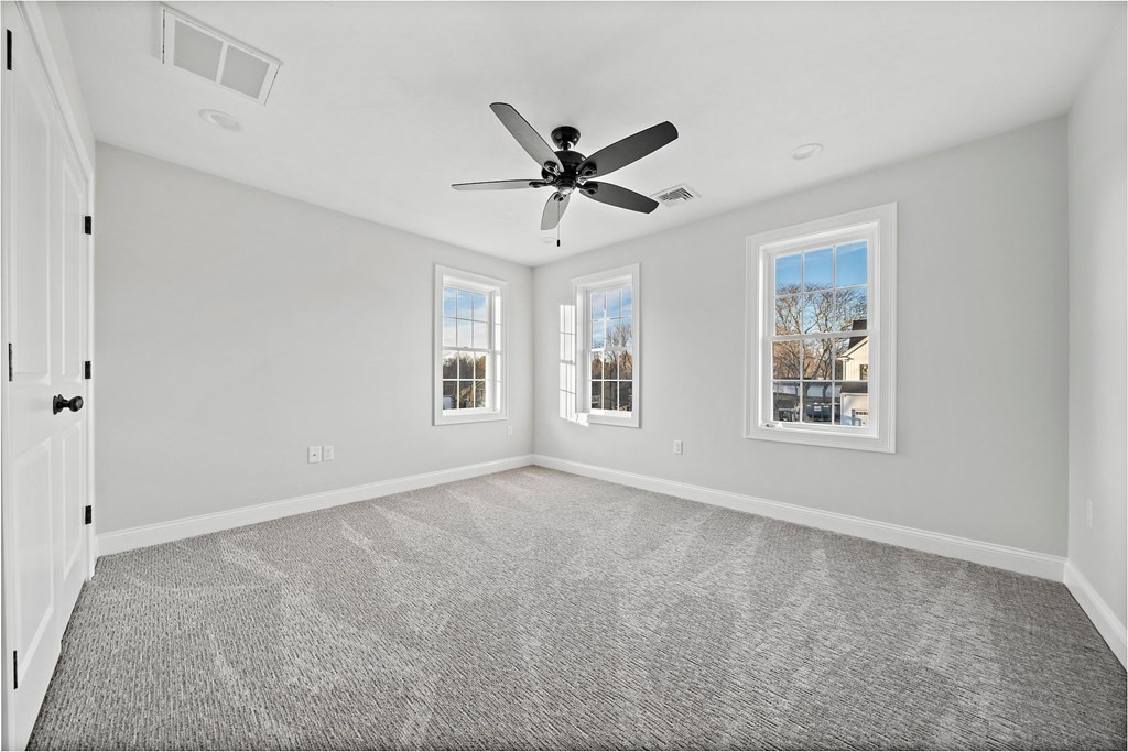 2 Pelissier Circle Randolph, MA 02368 - Photo 20 of 29 a view of an empty room with a window