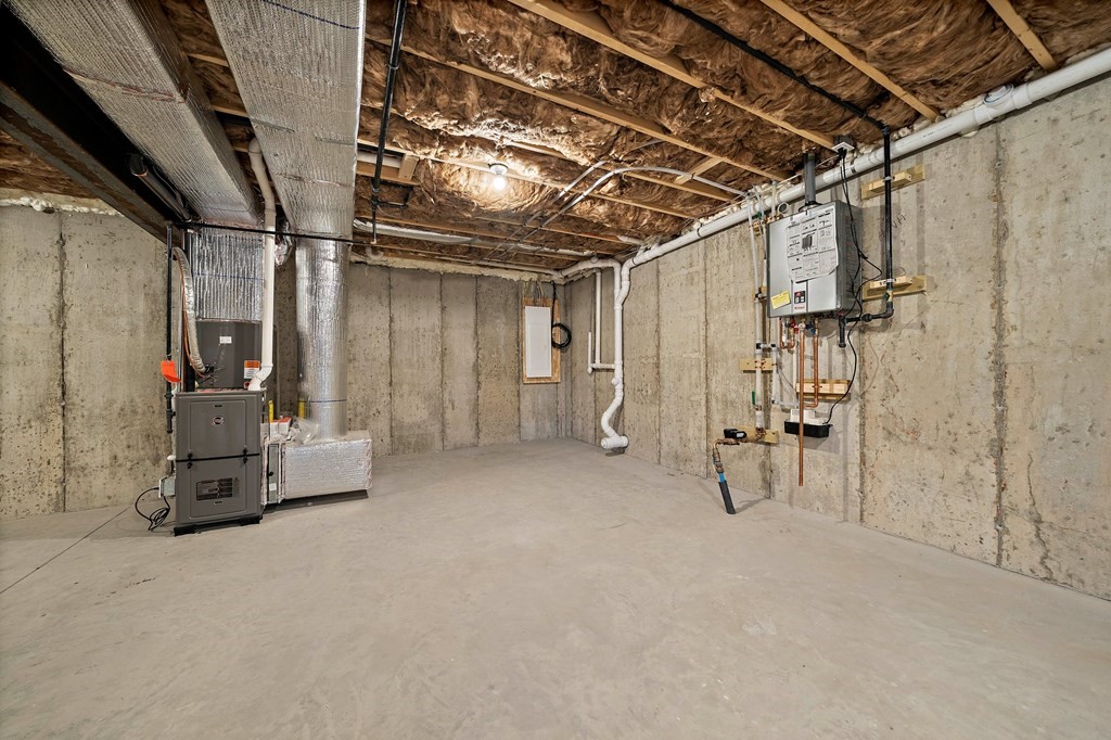 2 Pelissier Circle Randolph, MA 02368 - Photo 26 of 29 a view of empty room with wooden walls