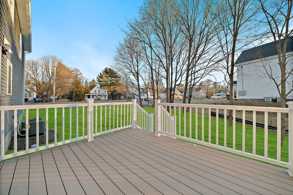 2 Pelissier Circle Randolph, MA 02368 - Photo 27 of 29 a view of a balcony with wooden floor