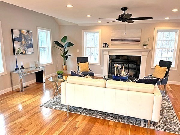 2 Pelissier Circle Randolph, MA 02368 - Photo 5 of 29 a living room with furniture and a fireplace