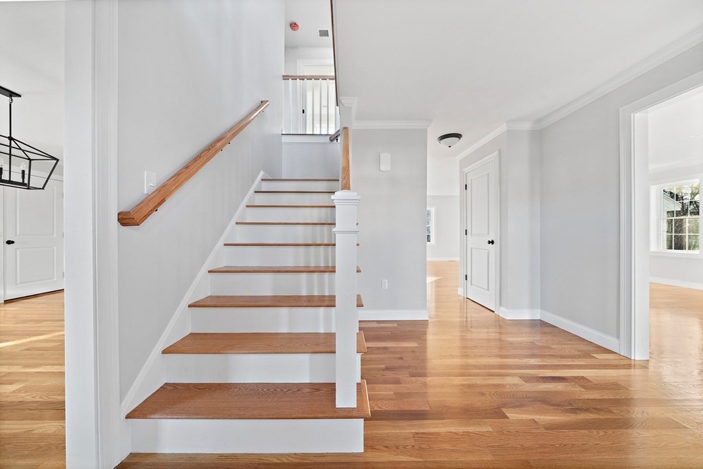 2 Pelissier Circle Randolph, MA 02368 - Photo 10 of 29 a view of entryway and hall with wooden floor