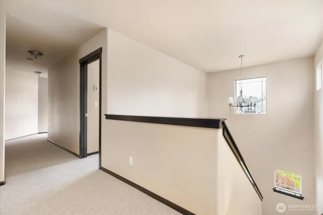 a view of a hallway with front door