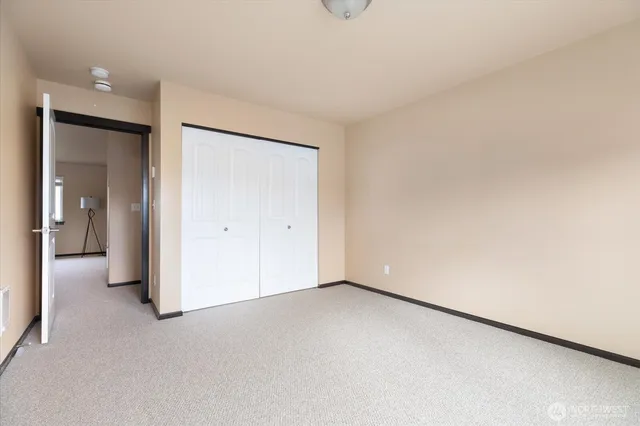 an empty room with a bathroom