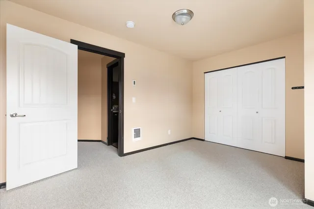 an empty room with closet