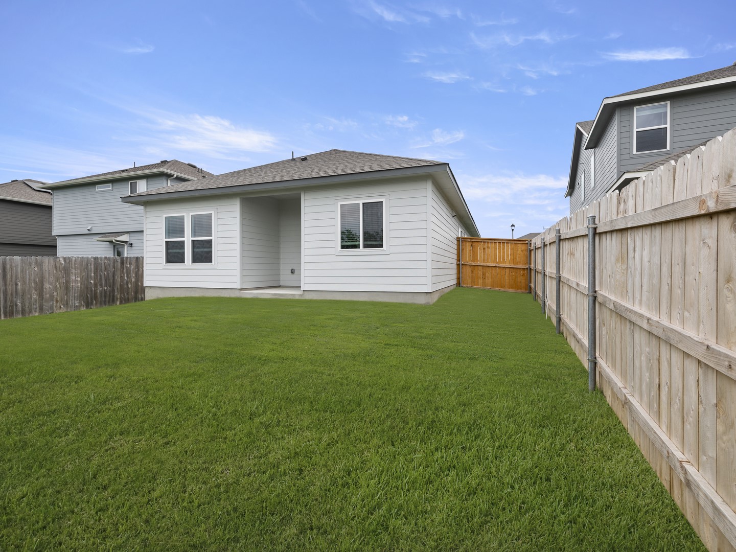 513 Yellow Ribbon Trail Jarrell, TX 76537 - Photo 16 of 23 A private yard with new fencing offers ample space for outdoor enjoyment.