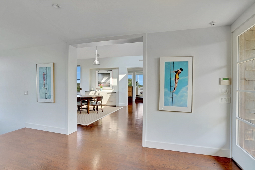2 Squibnocket Road Chilmark, MA 02535 - Photo 20 of 42 wooden floor in a hall with an entryway and dining room