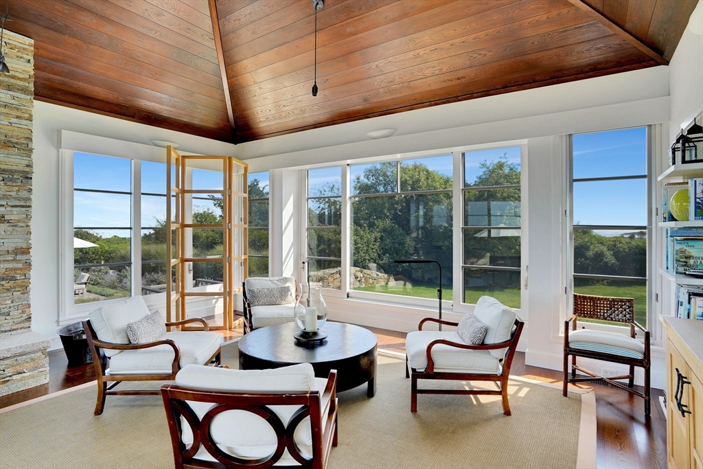 2 Squibnocket Road Chilmark, MA 02535 - Photo 21 of 42 a living room with furniture and a potted plant