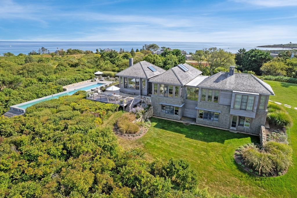 2 Squibnocket Road Chilmark, MA 02535 - Photo 4 of 42 a aerial view of a house with a big yard
