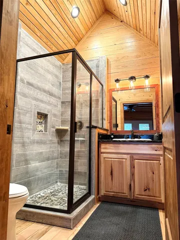 a view of a fireplace with wooden floor
