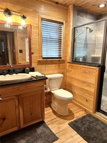 a bedroom with double bed and a walk in closet