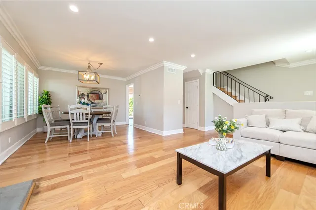 a living room with furniture and a table
