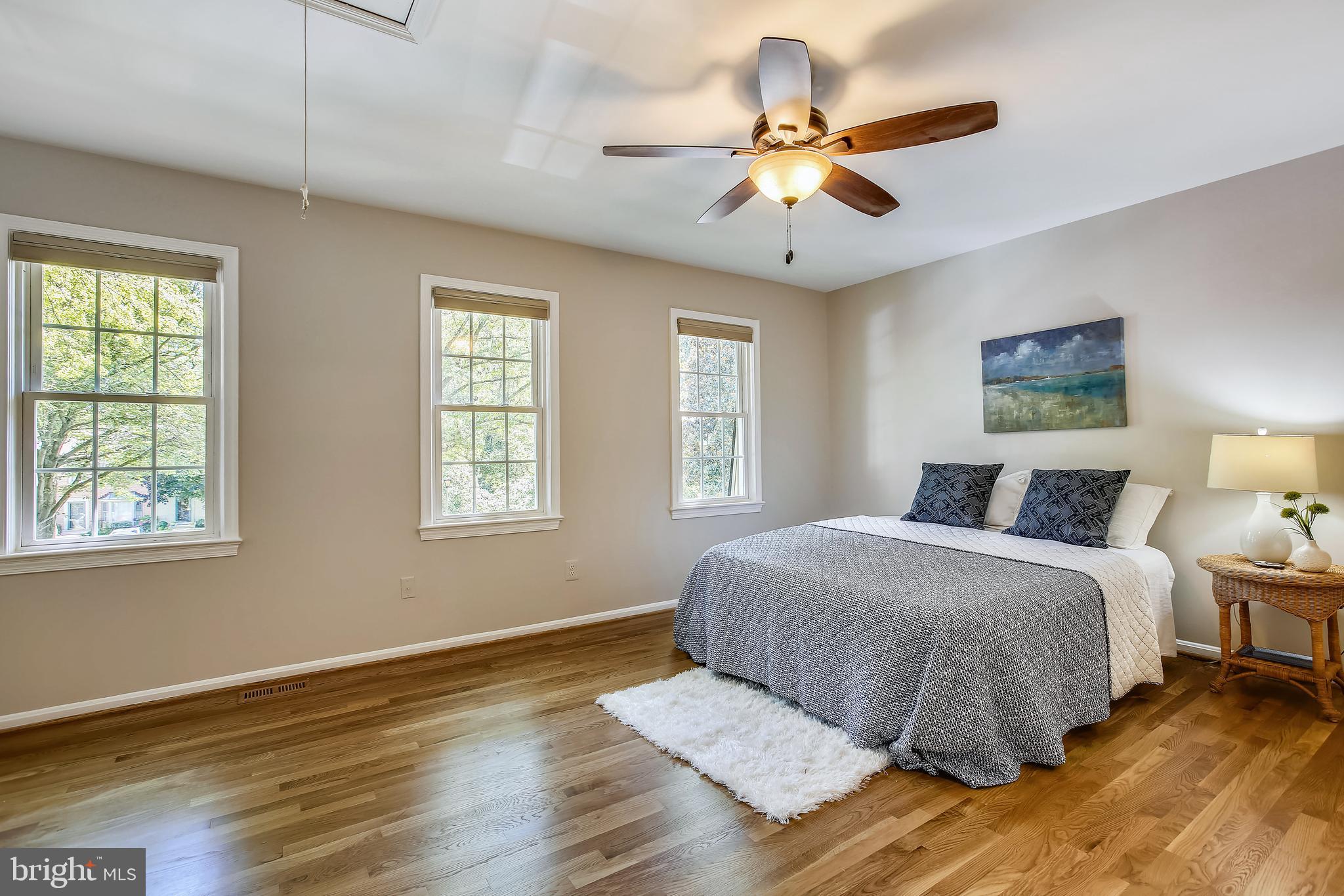 2180 Pond View Court Reston, VA 20191 - Photo 13 of 35 Real hardwood in the primary bedroom