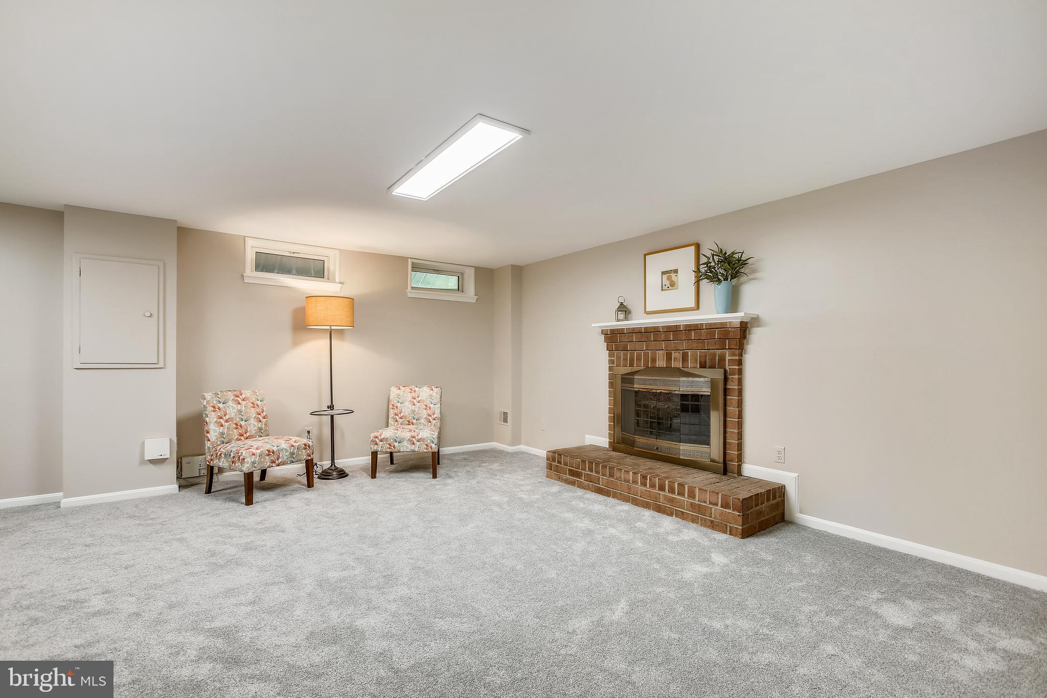 2180 Pond View Court Reston, VA 20191 - Photo 25 of 35 Rec room with wood burning fpl