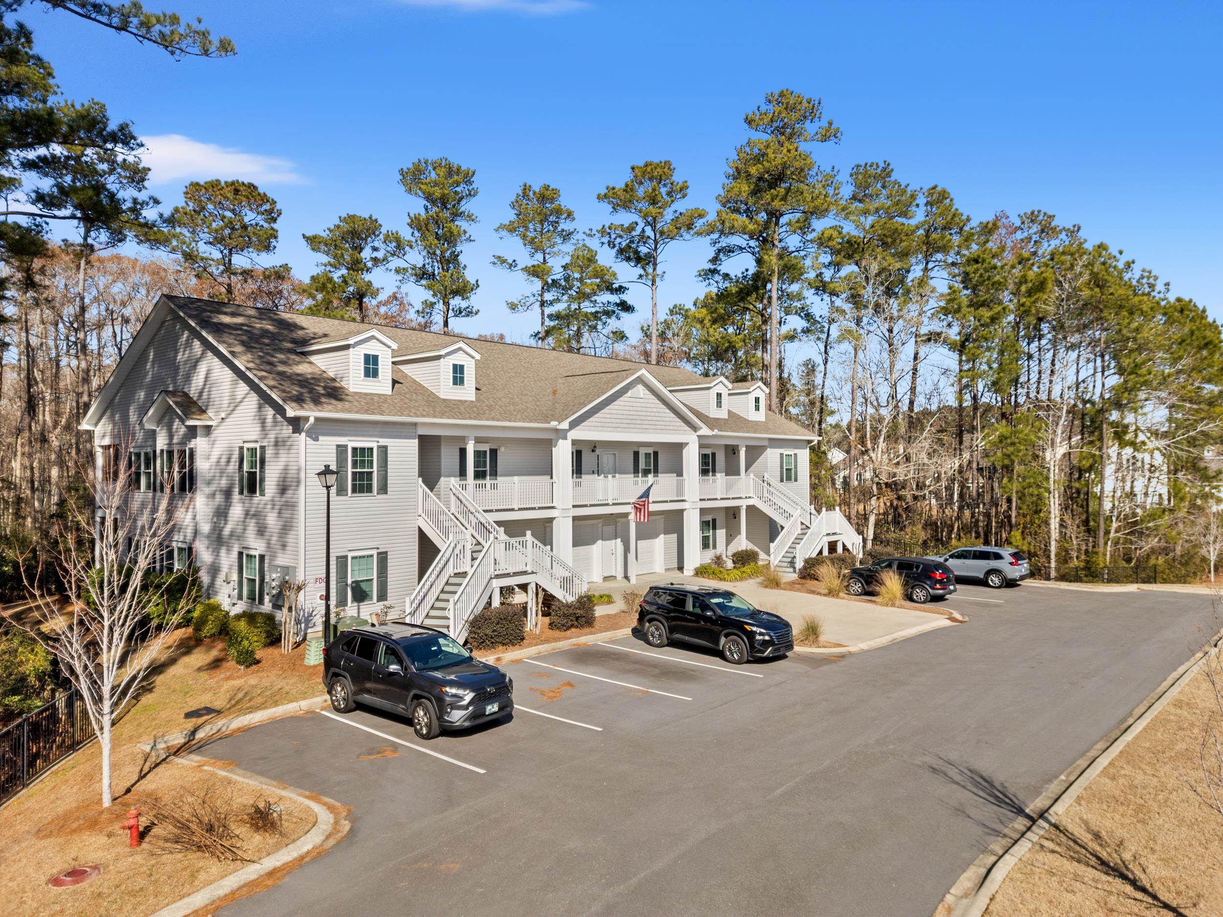 900 Jackline Place, Unit 202 Murrells Inlet, SC 29576 - Photo 14 of 39 View of asphalt street with stairway and curbs