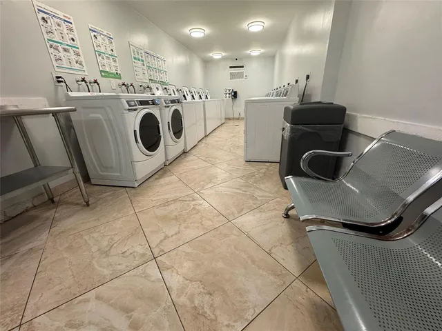 a storage room with washer and dryer