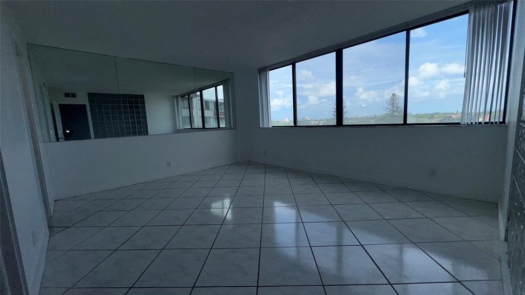4222 Inverrary Boulevard, Unit 4711 Lauderhill, FL 33319 - Photo 5 of 11 a view of an empty room with a window