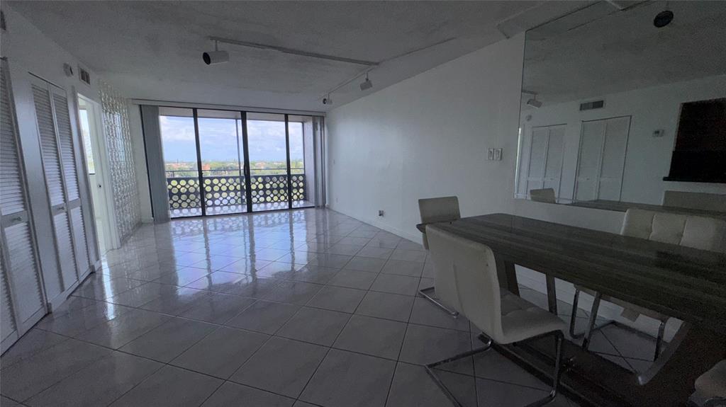 4222 Inverrary Boulevard, Unit 4711 Lauderhill, FL 33319 - Photo 9 of 11 a view of an empty room with a window