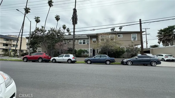 a view of a cars parked in front of a building