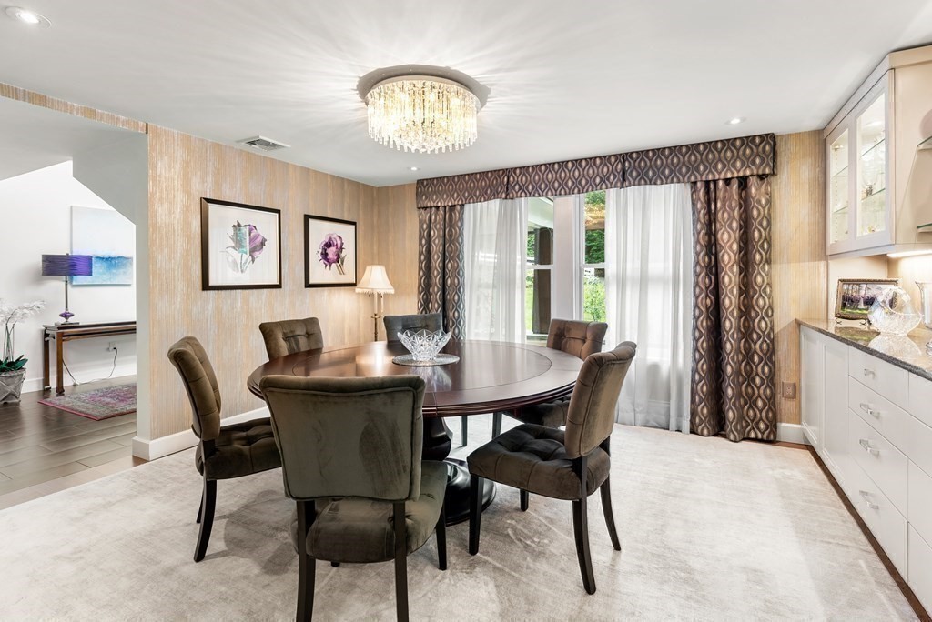 328 Dover Road Westwood, MA 02090 - Photo 15 of 41 a view of a dining room with furniture window and wooden floor