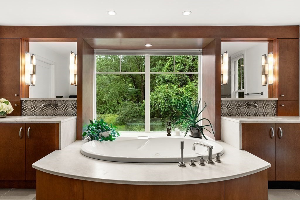 328 Dover Road Westwood, MA 02090 - Photo 18 of 41 a room with a sink and a mirror