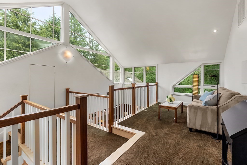 328 Dover Road Westwood, MA 02090 - Photo 20 of 41 a living room with large windows and furniture