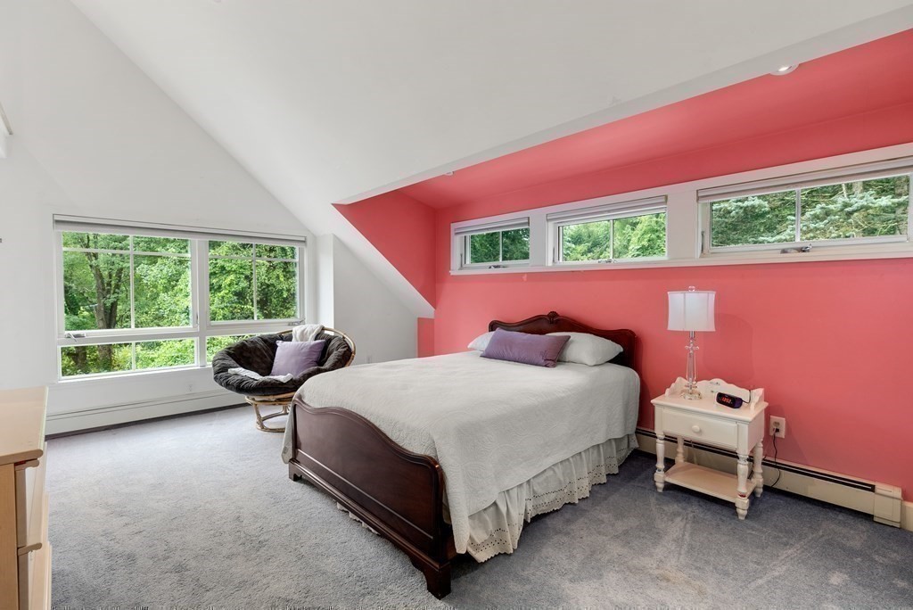 328 Dover Road Westwood, MA 02090 - Photo 21 of 41 a bed room with a bed and a chair