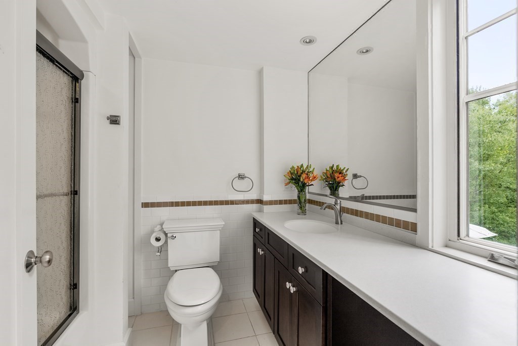 328 Dover Road Westwood, MA 02090 - Photo 22 of 41 a bathroom with a toilet sink and mirror