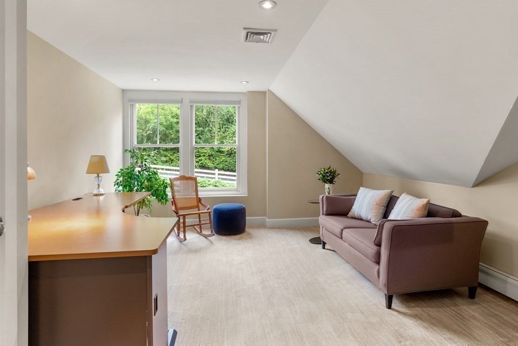 328 Dover Road Westwood, MA 02090 - Photo 24 of 41 a living room with furniture and a window